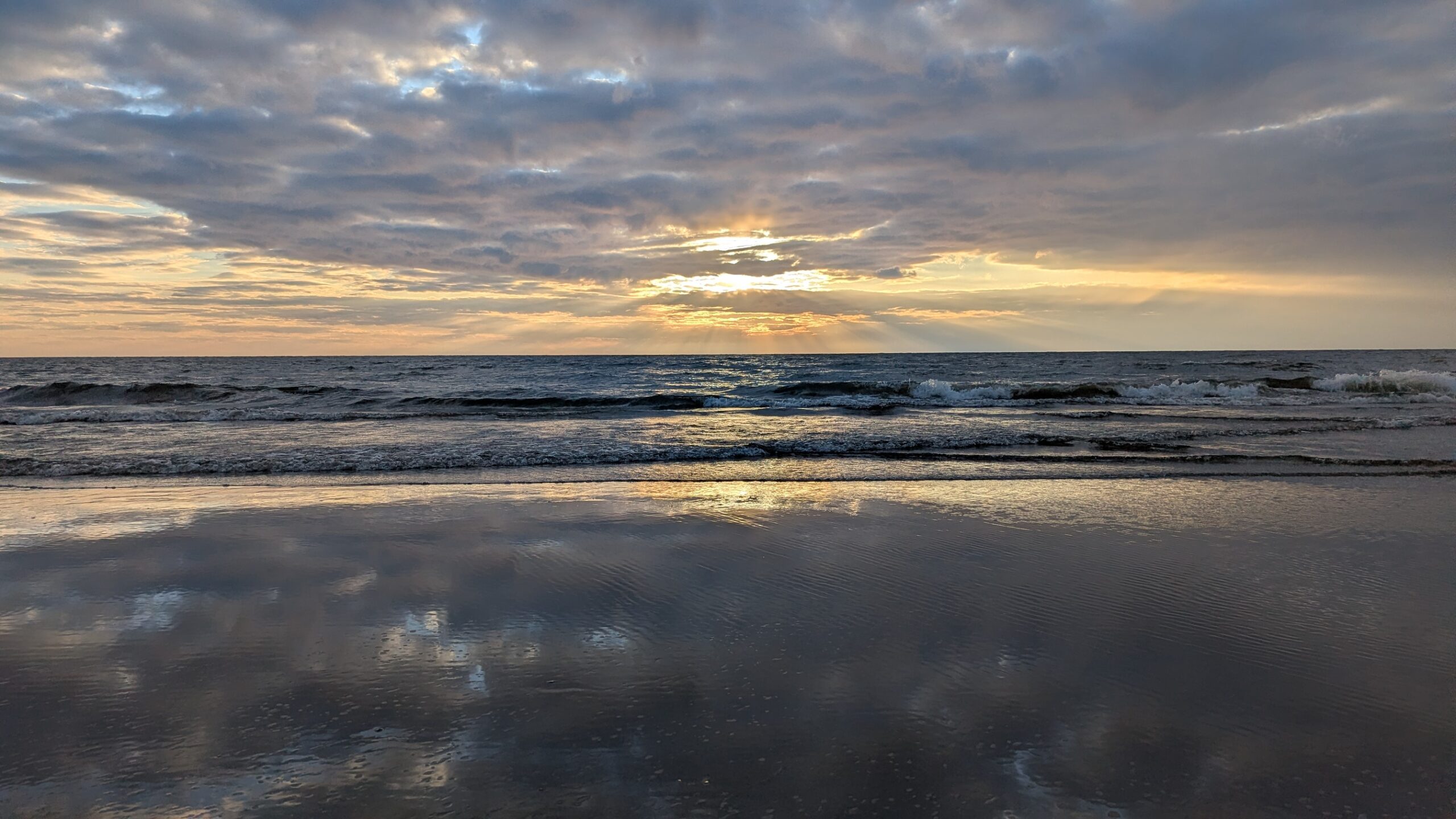 Sunset at Kirk Park in Ottawa County, Michigan, Friday, March 27, 2026